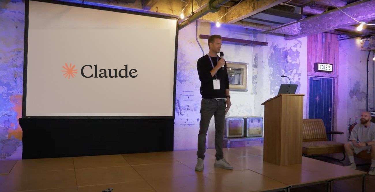 Mark Byrne, founder of XGrowth, speaking on stage